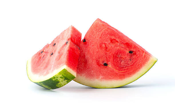 Two slices of watermelon on a white background. Studio photography on a white background.