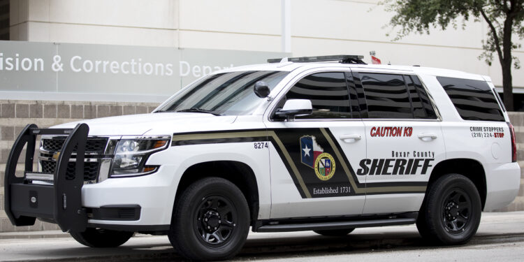 A Bexar County sheriff squad car sits outside of a county building during a recruitment event hosted by the Bexar County sheriff’s office on Saturday.