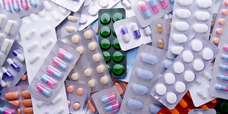 Colorful Assortment Of Medicine Tables & Capsules.